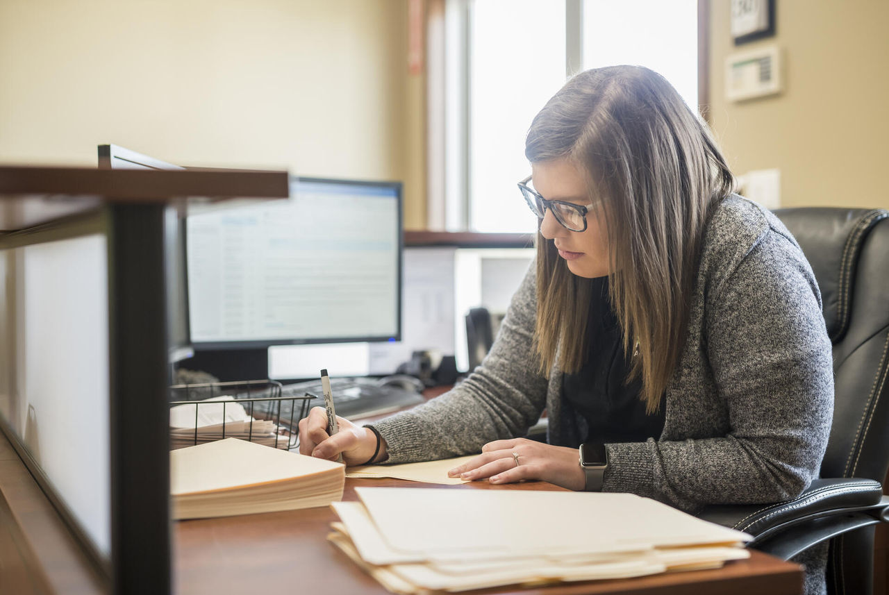 Farmer Reviewing documents